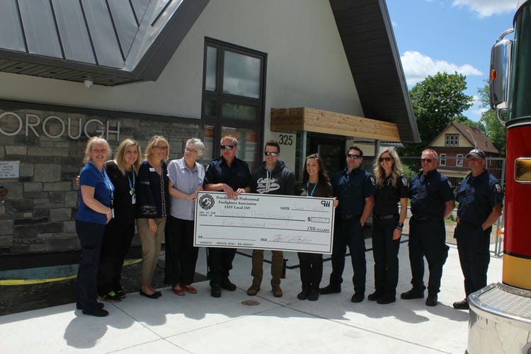 Photo of PPFA cheque presentation - Pictured (left to right): Jody Taylor, Sarah Youmans, Shelley Barrie, Linda Sunderland, Joe O'Brien, Mike O'Brien, Alley Heard, Jason Cooper, Amanda Nichols, Herb Koning, Ian Robertson.